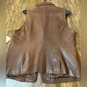 Beautiful! Coldwater Creek Small, true to size, brown, leather vest.